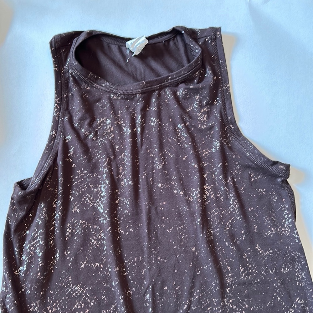 Two Champion work out tanks by Champion, sizes xs. Come together.